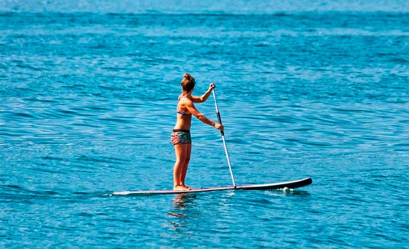 Ejercicios para perder peso y tonificar: el paddle surf, el